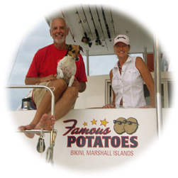 Couple satisfied with their new boat lettering.
