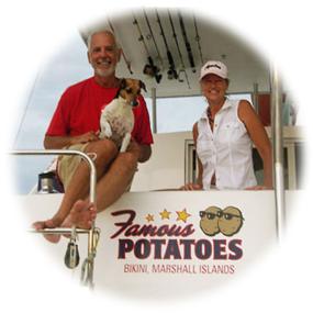 Couple satisfied with their new boat lettering.